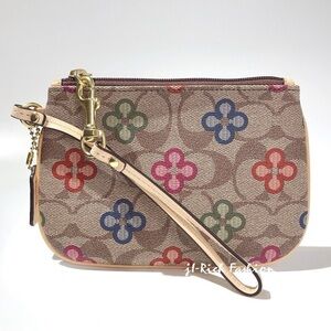Coach signature tan & clover wristlet